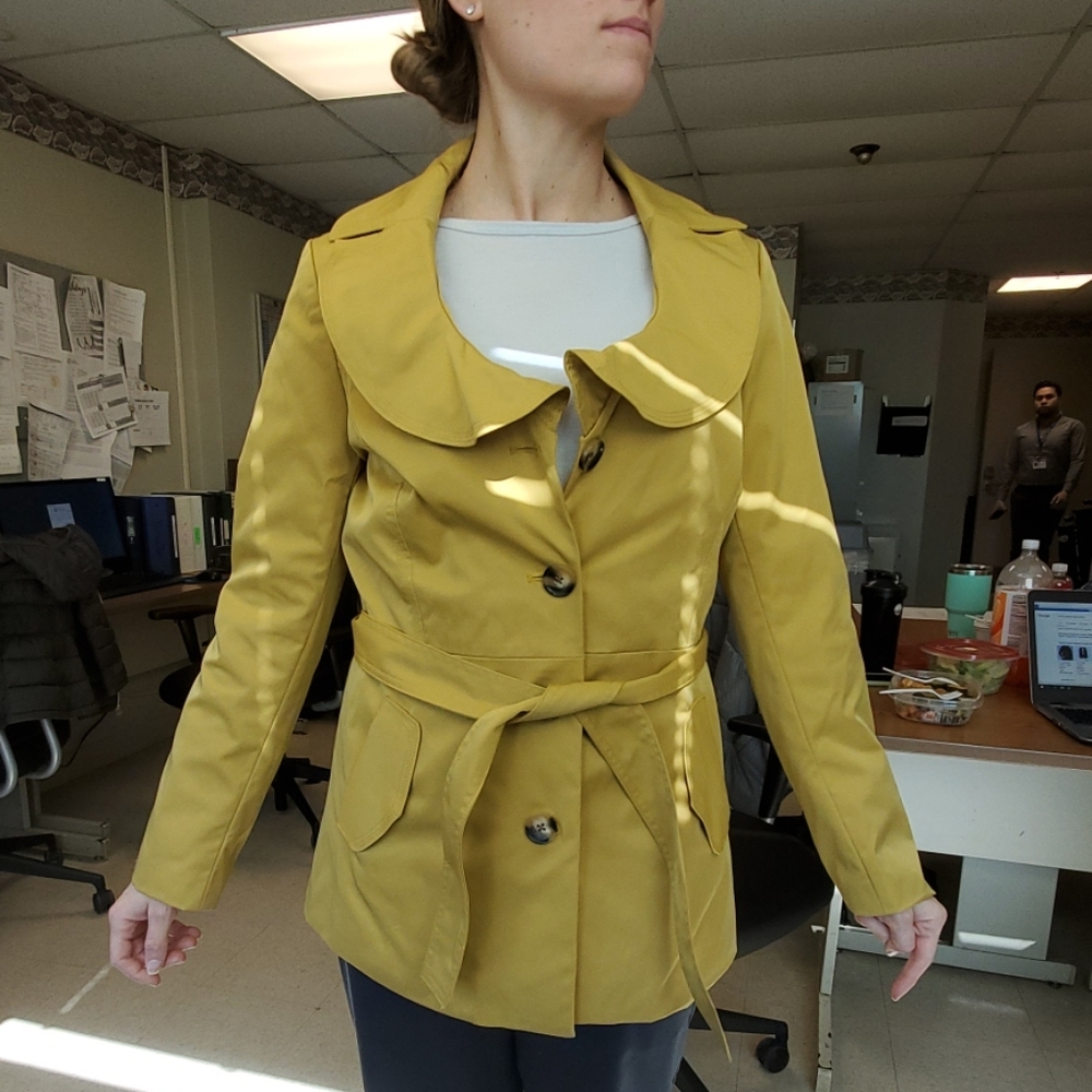 Yellow peacoat spring light